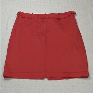 The Limited Bright Coral Mini Skirt with little buckle details